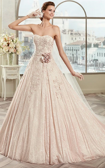 Romantic Strapless A-Line Bridal Gown With Floral Waist And Fine Appliques