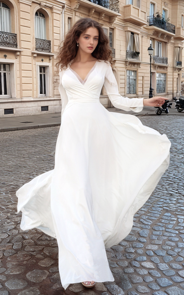 Bohemian Long Sleeve V-Neck Wedding Dress with Flowing Skirt
