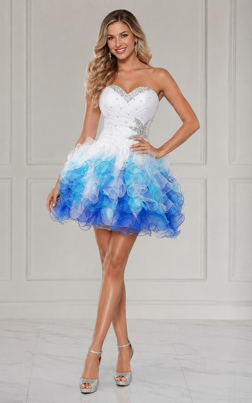 Mini-Kleid mit herzförmigem Herzausschnitt, Perlenbesatz, Rüschen und Schnürung am Rücken