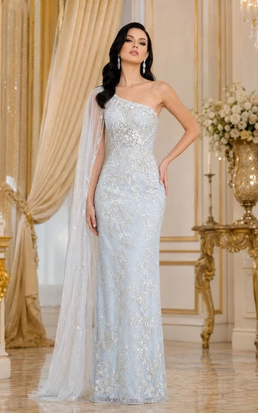 Vestido de noche tipo capa azul cielo de un solo hombro con cuentas, ideal para eventos nocturnos y formales.