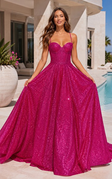 Robe de bal fuchsia à paillettes avec décolleté en cœur et dos lacé