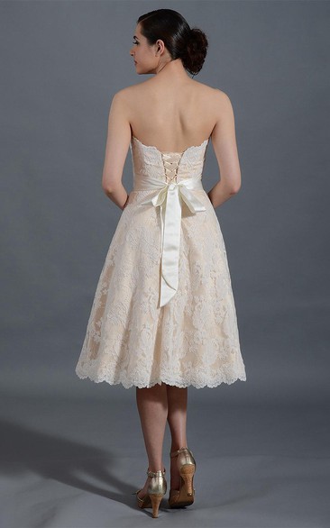 Knee Length A-Line Lace Gown With Lace-Up Back and Back Bow