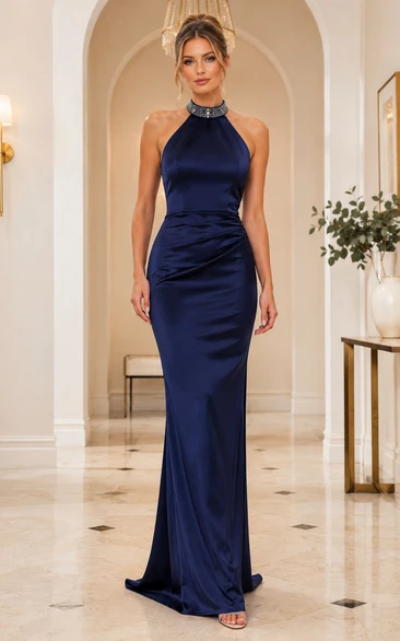 Robe de soirée fourreau bleu marine foncé à dos nu et col halter