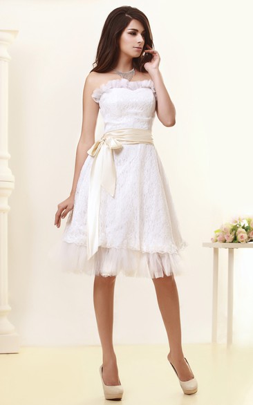 Strapless Knee-Length Dress With Bow and Appliques
