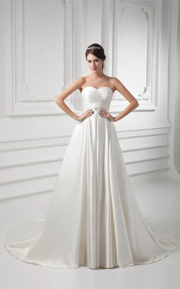 Sweetheart A-Line Criss-Cross Broach and Gown With Pleats