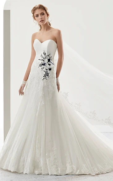 Sweetheart Bridal Gown With Striking Floral Appliques And Brush Train