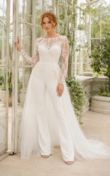Combinaison de mariée ivoire en dentelle à manches longues avec surjupe en tulle