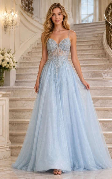 Vestido de gala azul cielo de tul con tirantes finos, corpiño tipo corsé y falda brillante para graduación.