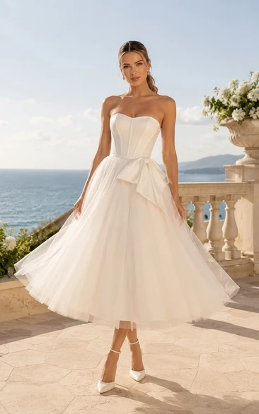 Robe de mariée bustier en tulle longueur thé