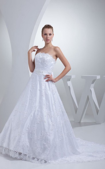 Strapless Appliqued A-Line Gown With Bow and Beading