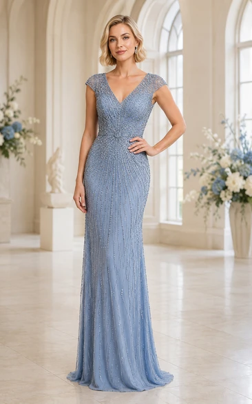 Vestido formal ajustado de encaje con lentejuelas y mangas cortas en color azul acero con escote en V.