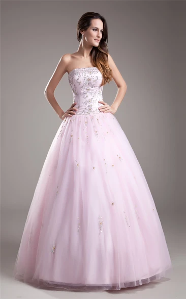 Blushing Strapless Beaded Ball Gown With Tulle Overlay
