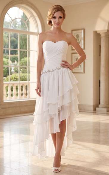 Robe midi asymétrique en mousseline à volants et décolleté cœur