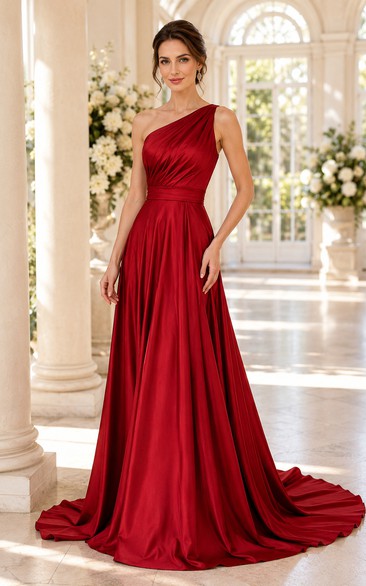 Vestido de noche rojo de satén con un solo hombro, corte en A y cola larga hasta el suelo.