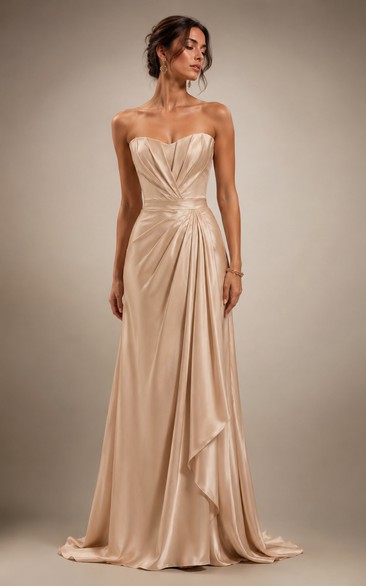 Robe de soirée en satin champagne, corsage structuré, longueur au sol, drapée