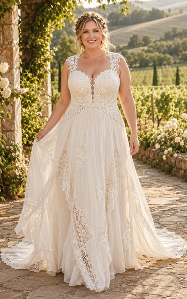 Vestido de novia de talla grande con escote corazón, encaje, tul y corte en A con tirantes.