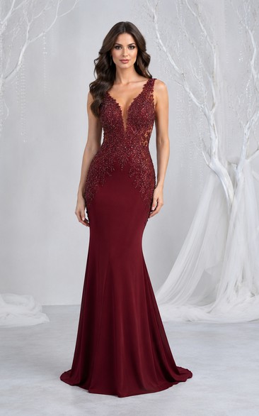 Robe de soirée sirène bordeaux à col en V et corsage en dentelle, idéale pour les soirées et les événements formels.