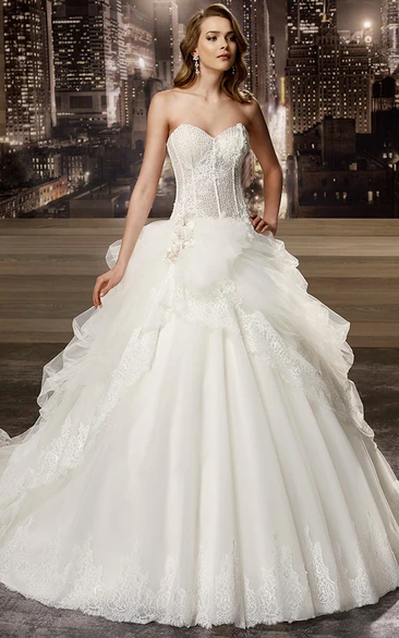 Sweetheart A-line Wedding Gown with Beaded Corset and Asymmetrical Ruffles