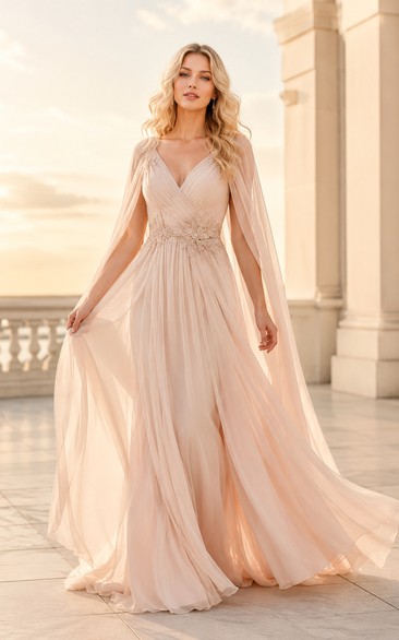 Vestido formal de gasa rosa empolvado de corte A con mangas largas tipo capa y escote en V.