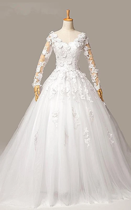 Precioso vestido de novia de tul con apliques de manga larga y corte princesa con cordones