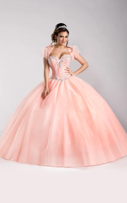 Robe de bal en tulle à corset à sequins et décolleté cœur, avec chemisier amovible et chemisier amovible.