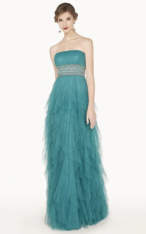 Robe de bal longue bustier en tulle à taille empire ornée de cristaux et jupe à volants