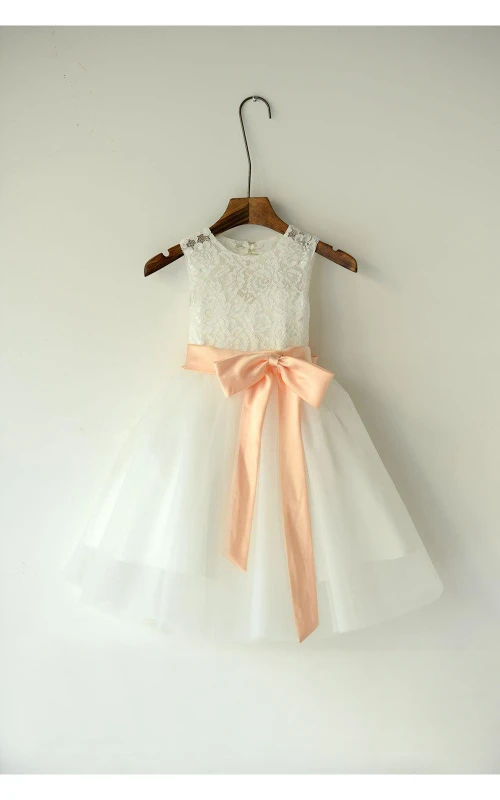 Robe de bal sans manches en organza avec dos nu et nœuds