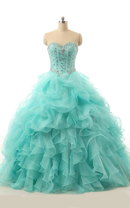 Vestido largo de gala con escote corazón, pedrería, cremallera y espalda con cordones, de organza y encaje.