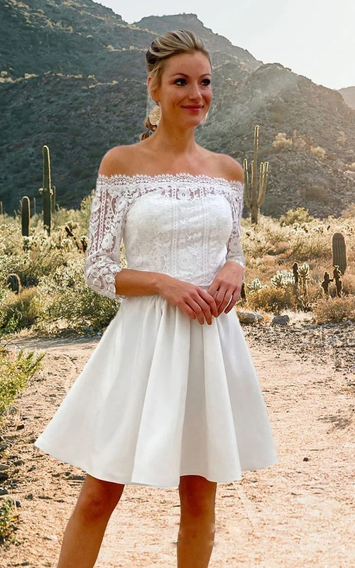 Vestido de novia informal de corte A con encaje, manga tres cuartos, efecto ilusión y fruncido.