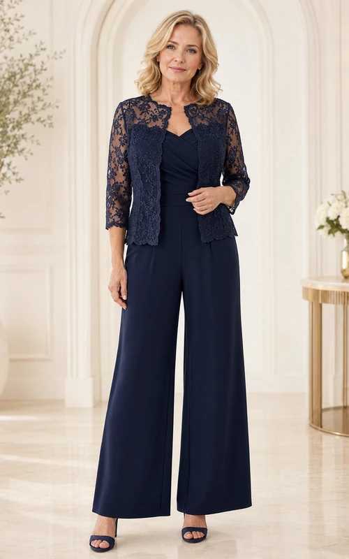 Dunkelblauer Jumpsuit mit Muttermotiv, Jacke mit Muschelspitzenbesatz und weit geschnittener Hose