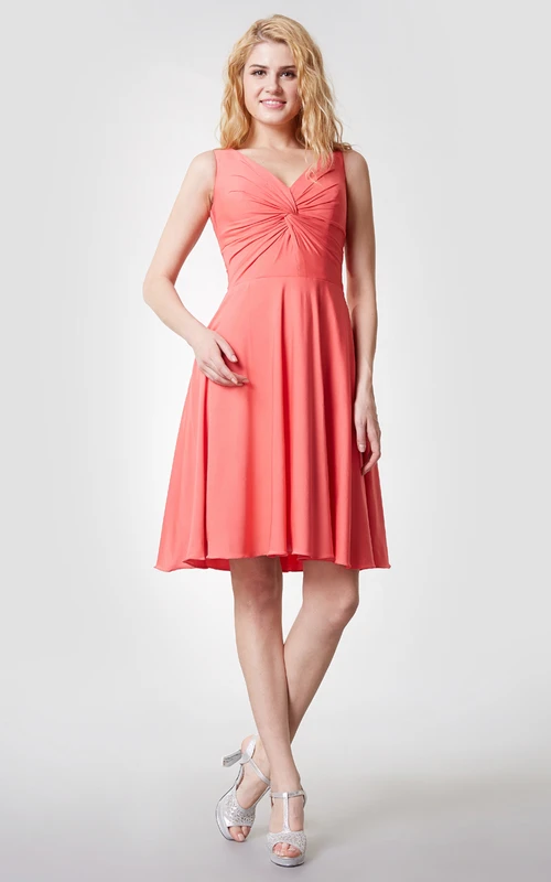 Robe en jersey confortable à col en V et longueur genou avec fronces