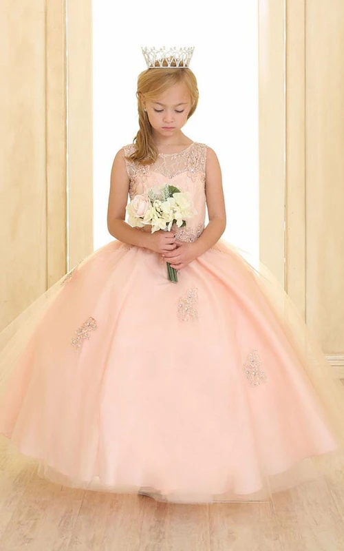 Vestido de niña de flores con volantes de tul y encaje con cuentas y efecto ilusión.