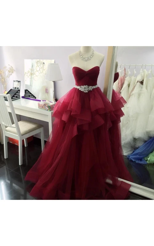 Magnifique robe de bal longue sans manches à volants