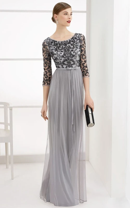 Vestido largo de fiesta de tul con escote redondo y espalda cuadrada descubierta, corpiño con cuentas.