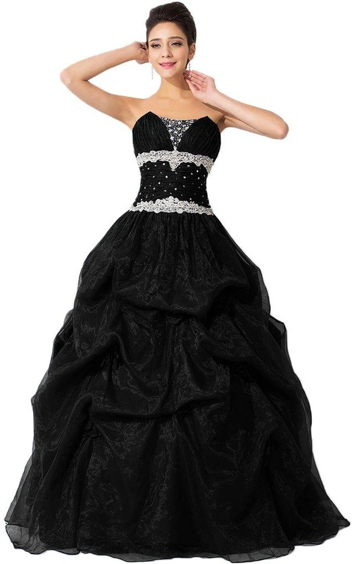 Vestido de gala sin tirantes con abalorios y volantes.
