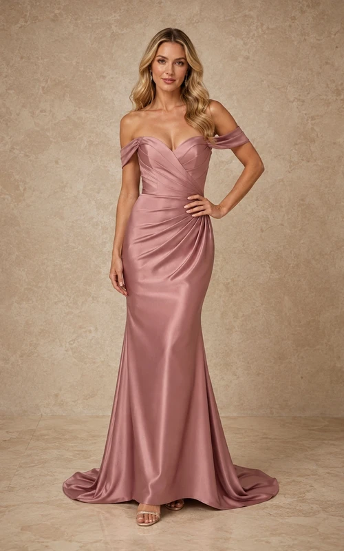 Robe de soirée élégante en satin rose poudré, épaules dénudées, coupe sirène et traîne balayée jusqu'au sol