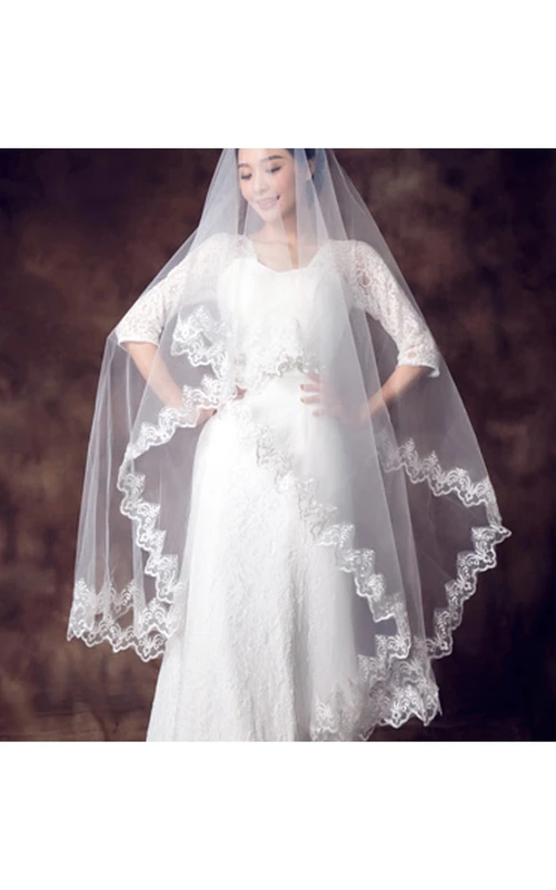 Voile de mariée en tulle souple bordé de dentelle