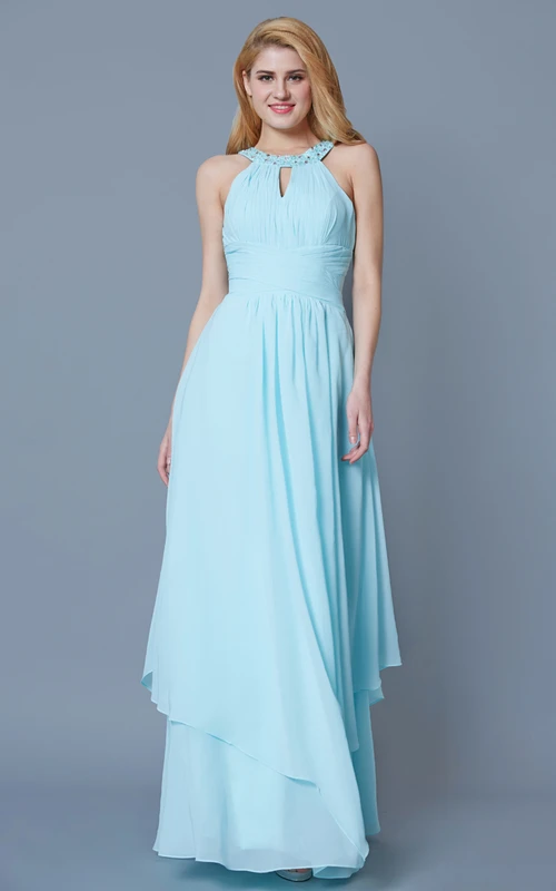 Vestido largo de gasa sin mangas con cuello joya y volantes