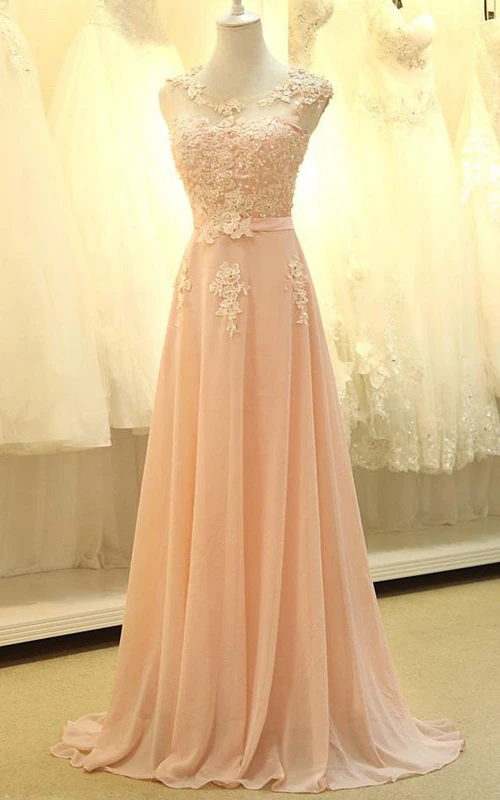 Robe longue sans manches en mousseline de soie, coupe trapèze, ornée d'appliqués de dentelle