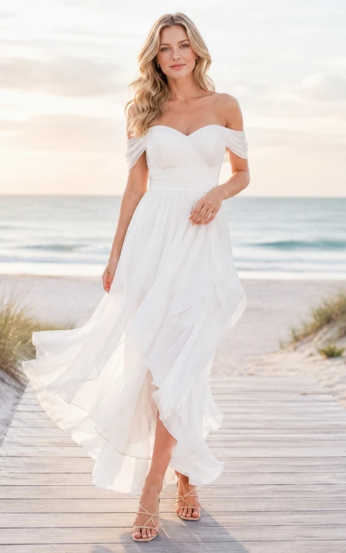 Vestido de novia bohemio romántico de gasa, corte A asimétrico, manga corta y escote Bardot, estilo bohemio, ideal para bodas en la playa.