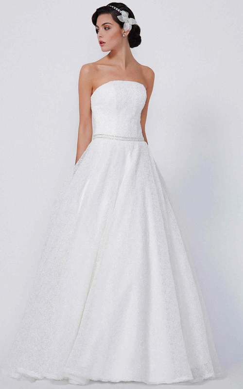 Vestido de novia largo hasta el suelo, sin tirantes, sin mangas y con encaje adornado con joyas, corte en A