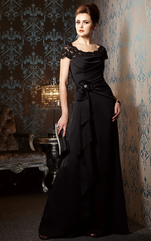 Vestido largo de manga corta para la madre de la novia con abalorios y volantes.
