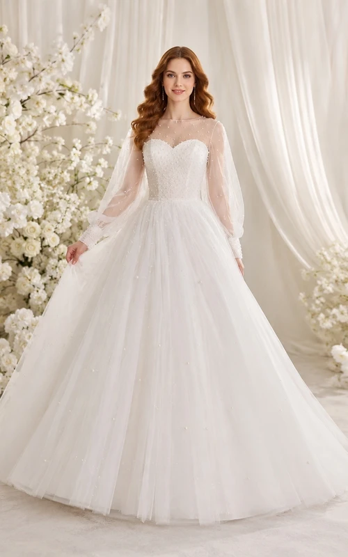 Elegante vestido de novia de corte A con escote cuadrado, manga larga, tul y cola catedral.