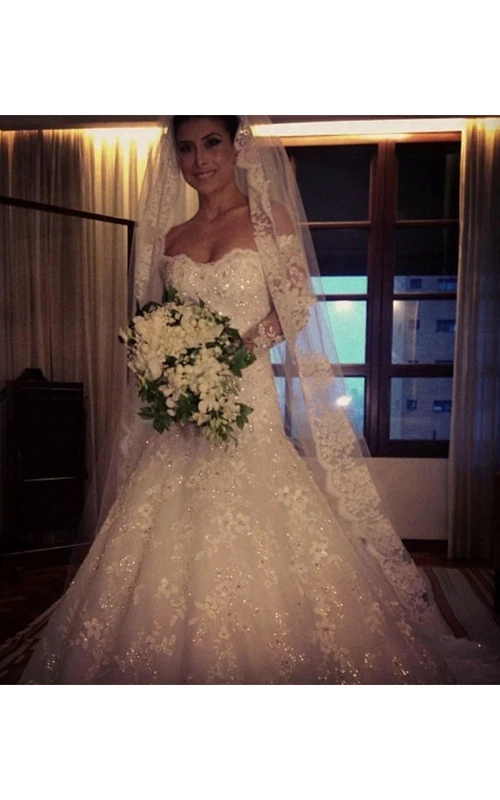 Magnifique robe de mariée sirène en dentelle à manches longues et traîne avec voile