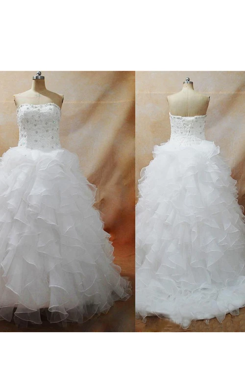 Elegantes, bodenlanges Brautkleid aus Organza mit sexy Schnürung am Rücken, Applikationen, Perlenbesatz und Rüschen