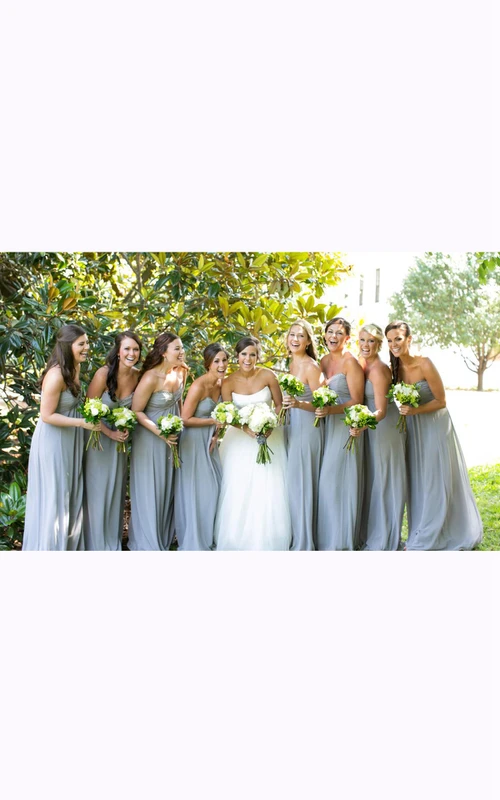 Vestido largo de gasa y tul con apliques de cuentas y escote corazón