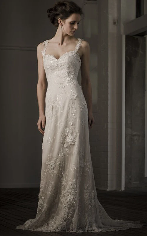 Vestido de novia largo hasta el suelo, sin mangas, con apliques de encaje, espalda en V profunda y flores.