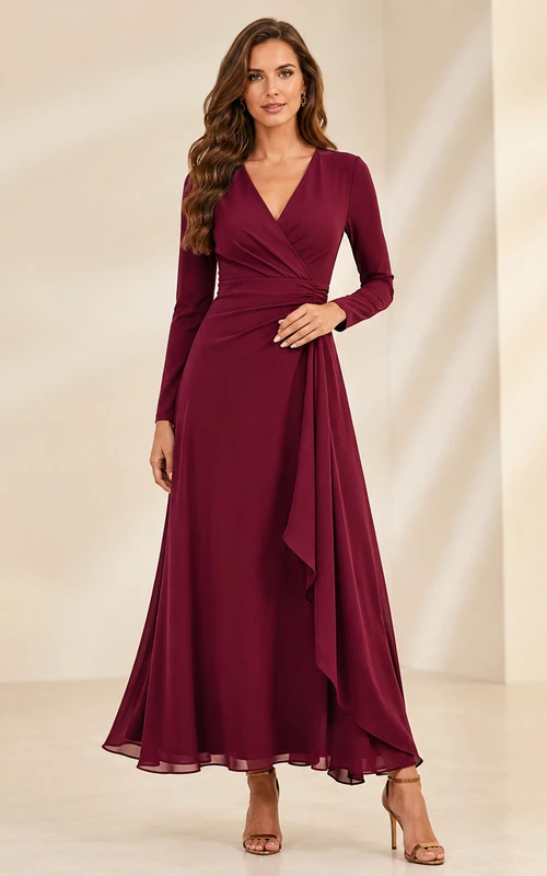 Vestido largo de gasa color burdeos con escote en V, manga larga, volantes en cascada y fruncido, corte en A, ideal para invitadas.