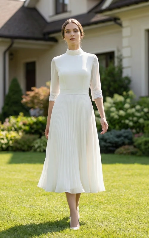 Robe de mariée en mousseline plissée à manches courtes et col rond
