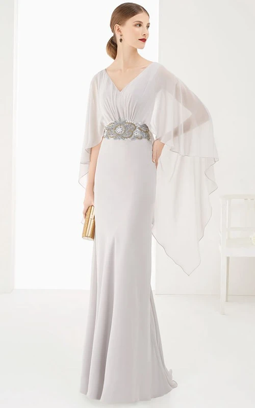 Robe de bal longue fourreau à col en V, manches chauve-souris asymétriques et taille ornée de perles